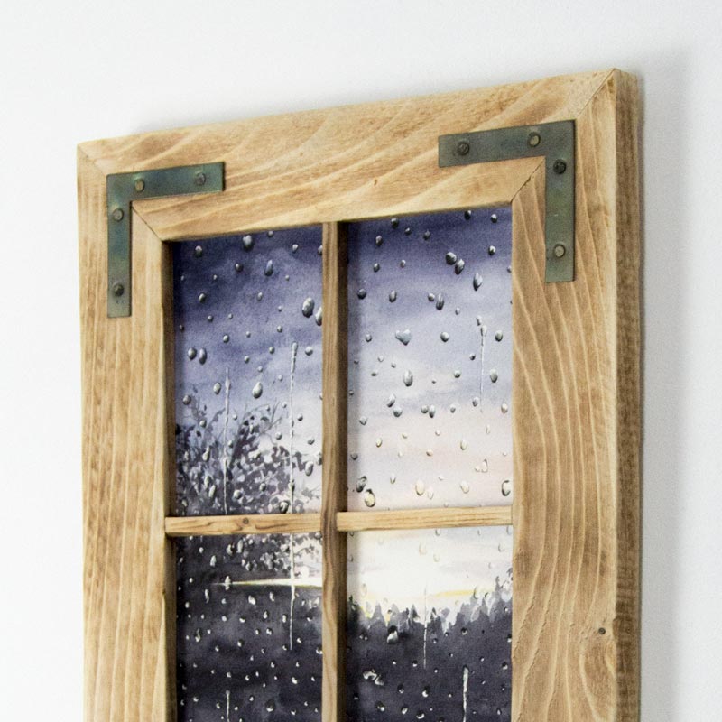 framed painting of a rainy window
