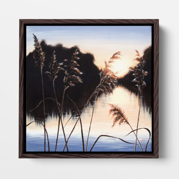 framed painting of a sunset