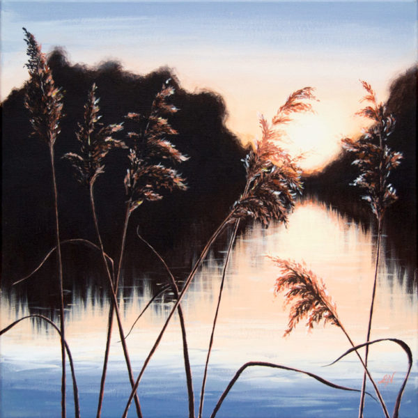 framed painting of a sunset