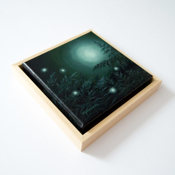 framed painting of a moonlit forest