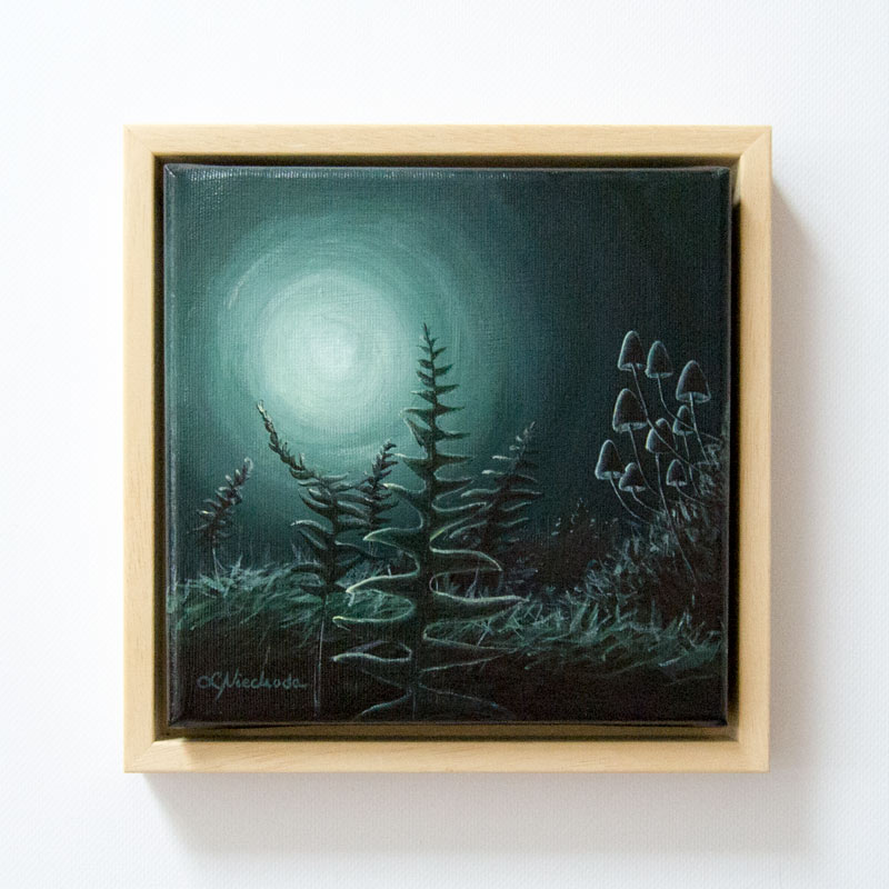 framed painting of a moonlit forest